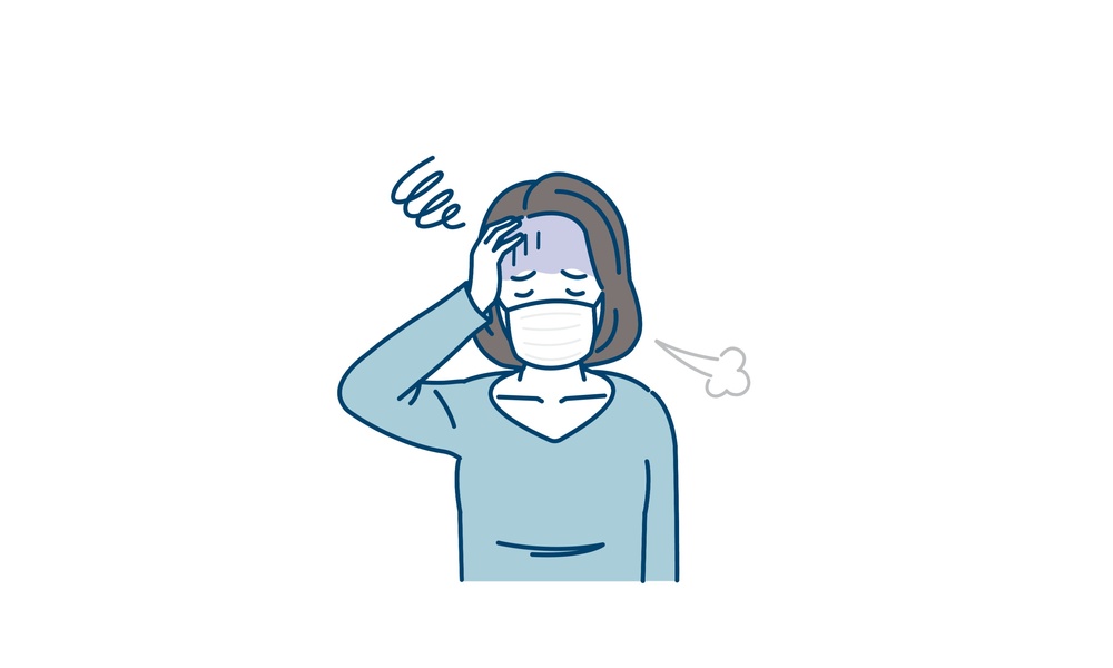 マスク着用で体調不良の女性